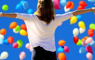 Woman extending her arms in confidence